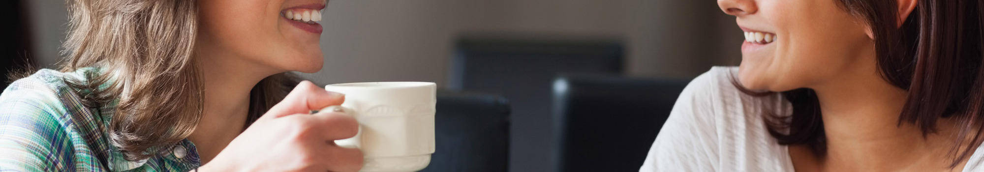 Girls catch up in cafe